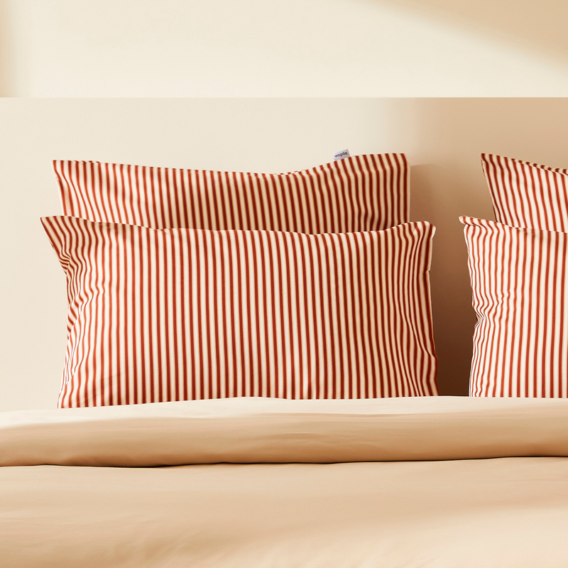 La taie d'oreiller en satin de coton bio