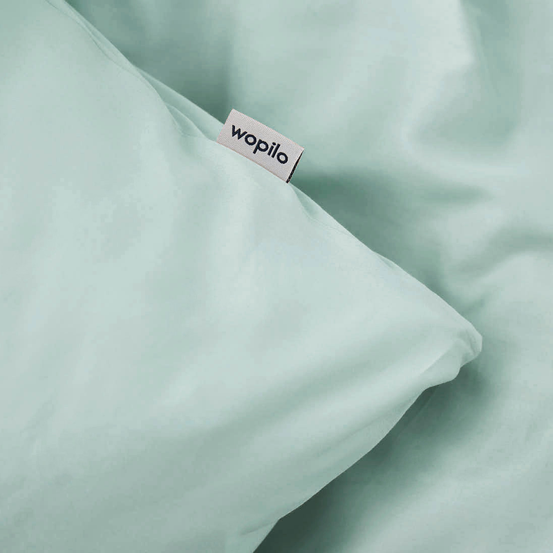 La housse de couette en satin de coton bio