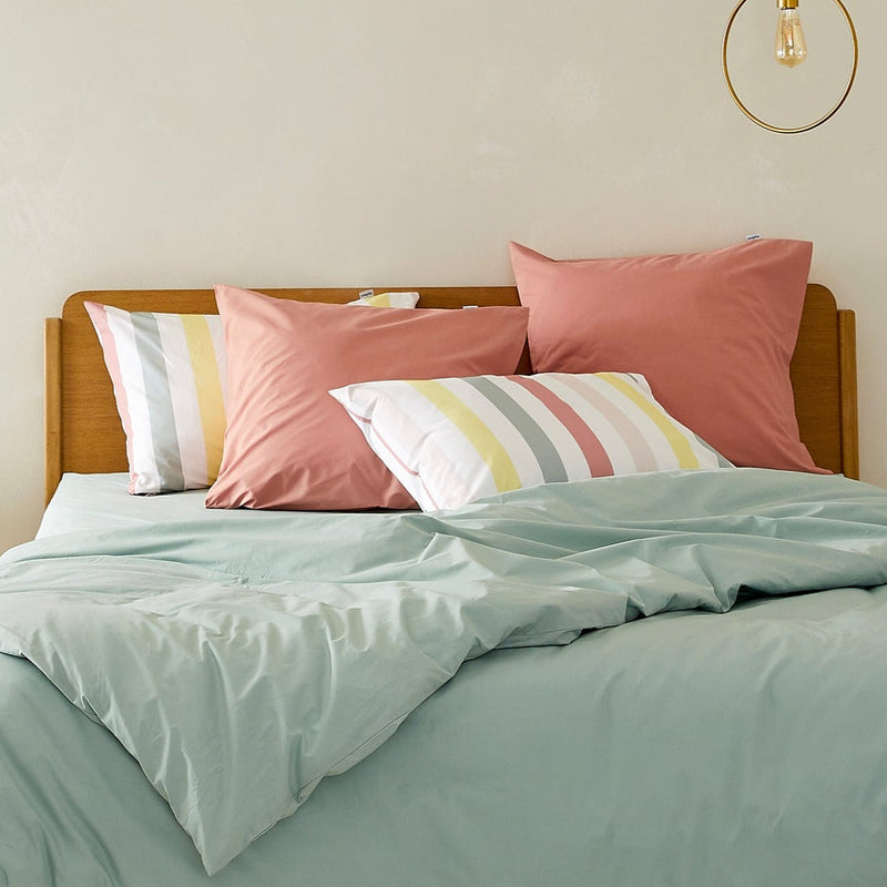 La taie d'oreiller en percale de coton bio