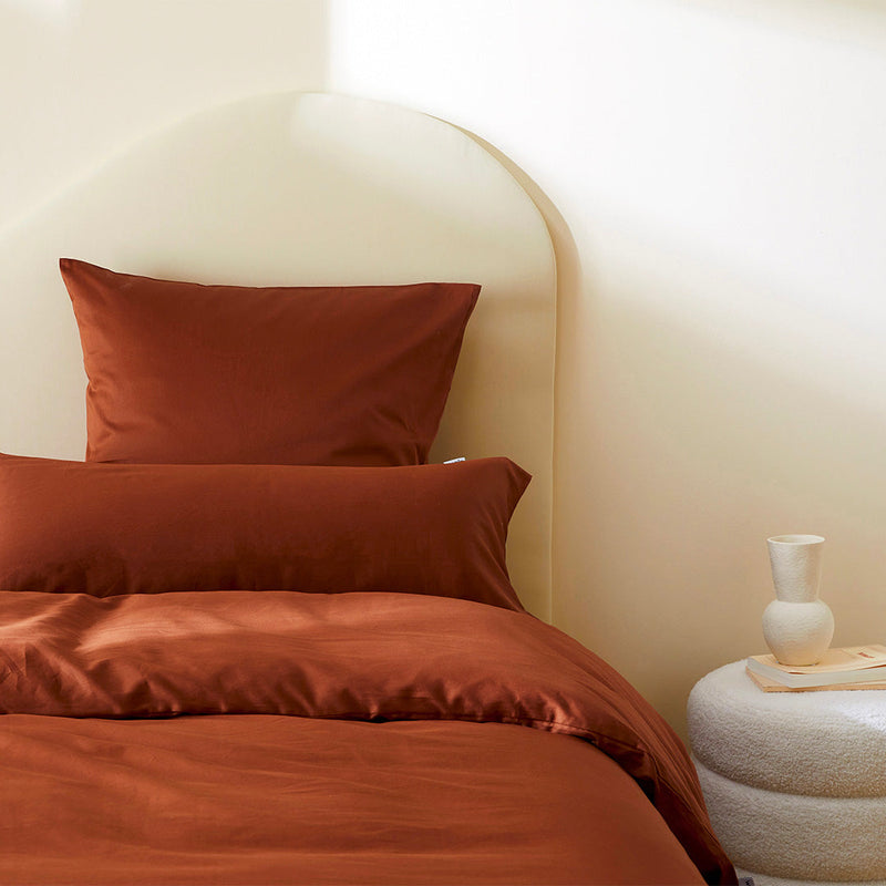 La taie de traversin wonderpilo en satin de coton bio