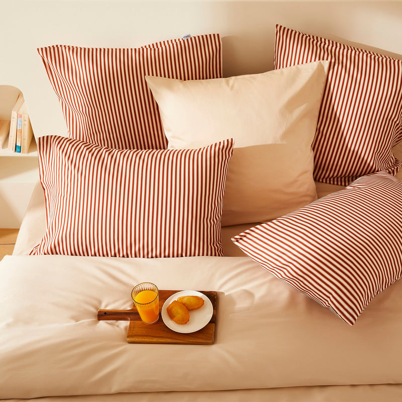 La taie d'oreiller en satin de coton bio